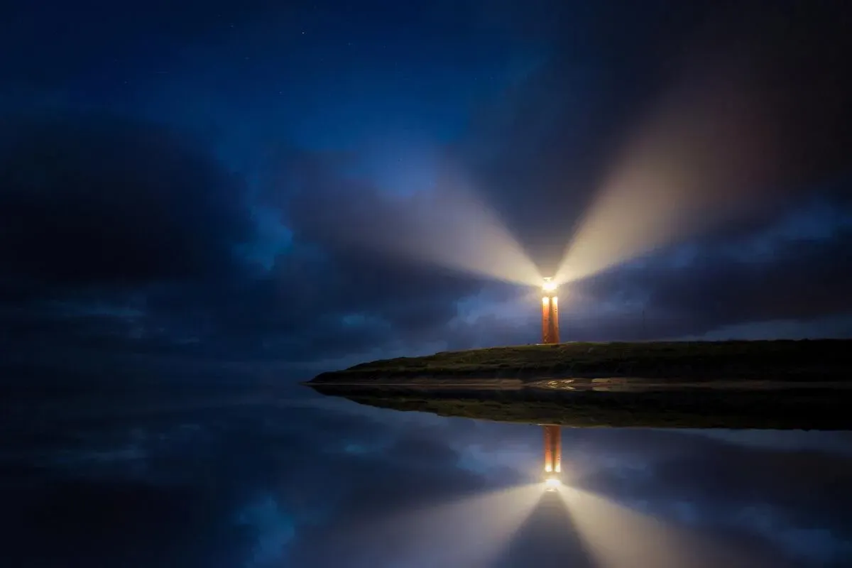 A lighthouse on the shore