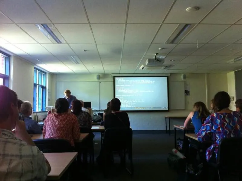 Ben livecoding a physics simulation at AIP congress