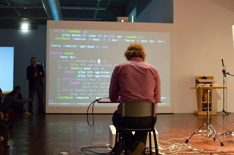 Ben performing live as a musical livecoder
